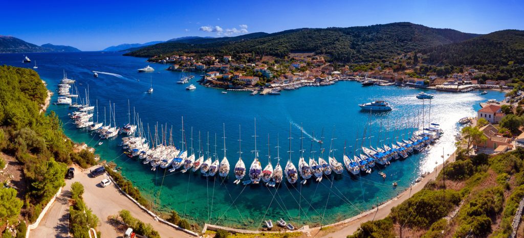 Yachts ancored in harbour in Fiskardo Kefalonia bay in Greece
