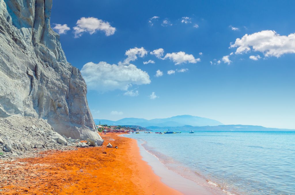 Beautiful view of Xi Beach, a beach with red sand in Kefalonia, Ionian Sea.