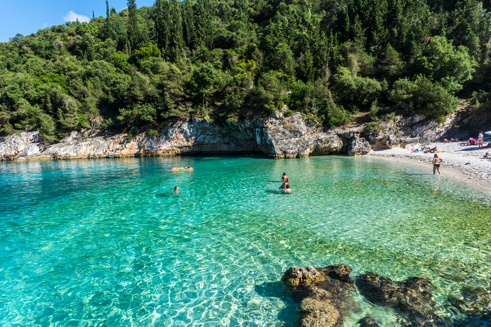 Dafnoudi is a small beach near Fiskardo in Kefalonia. It is well known for its clean green water and her small caves available for swimming - panoskord0 / shutterstock
