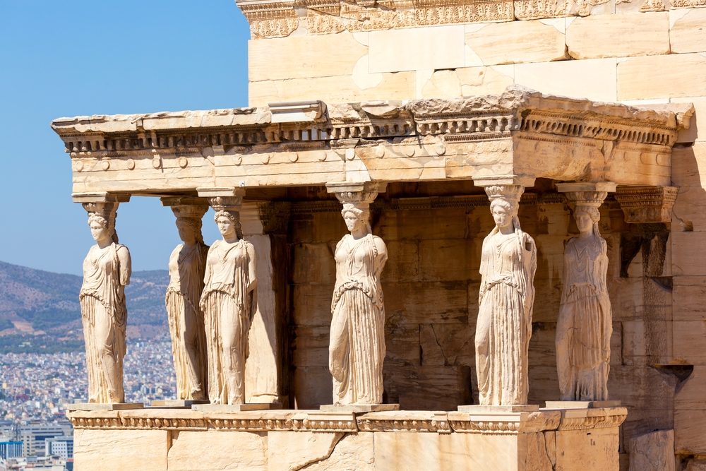 Ancient Erechtheion or Erechtheum temple with Caryatid Porch on the Acropolis, Athens, Greece. World famous landmark at the Acropolis Hill - Nick N A  / shutterstock